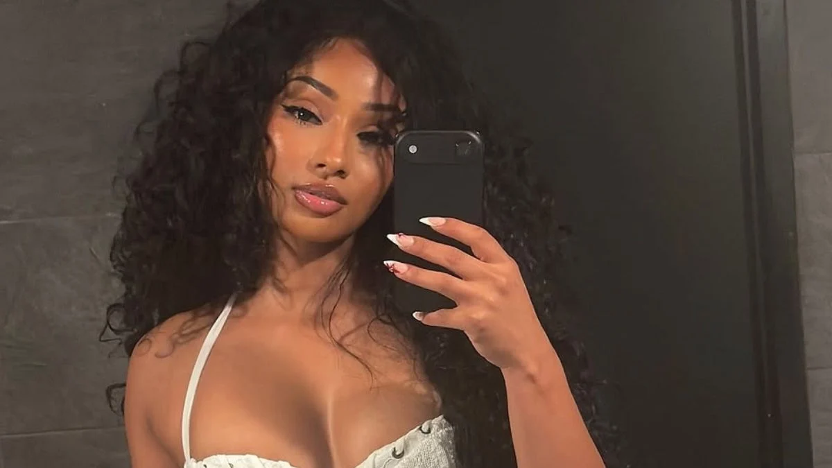 Rubi Rose Captivates Social Media with Bold Mirror Selfie in White Ensemble