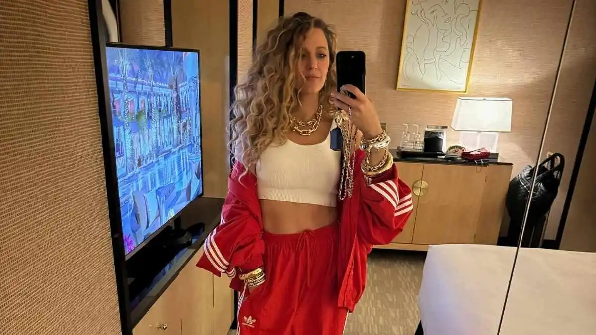 Blake Lively Masters Off-Duty Chic with Plunging Unbuttoned Shirt and Luxe Fendi Bag at Yankee Stadium