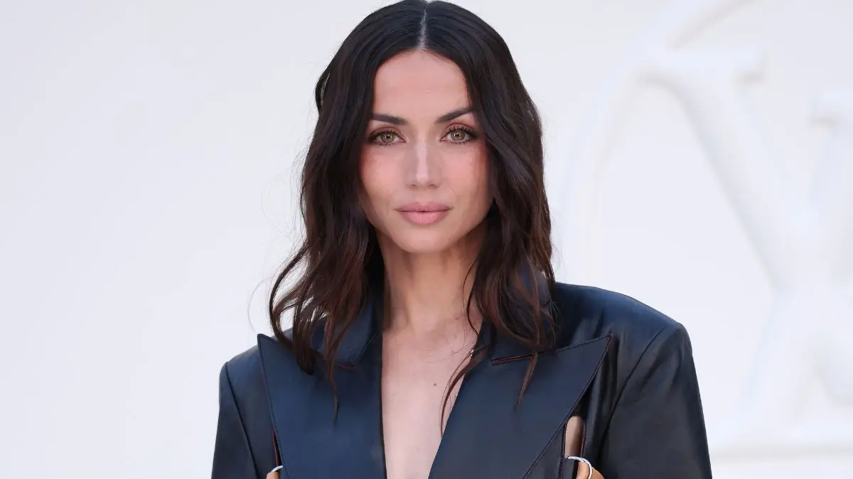 Ana de Armas Pairs Teeny Tiny Louis Vuitton Micro Shorts with Plunging Blazer at PFW