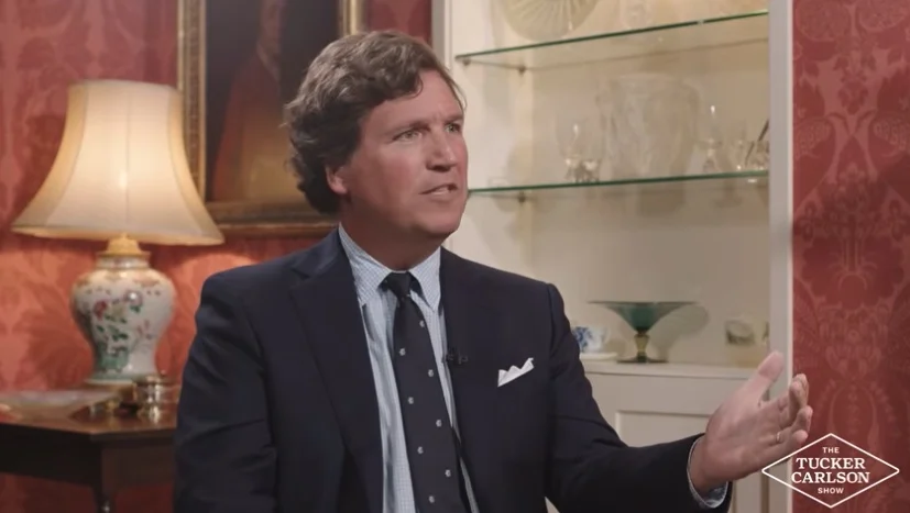 Tucker Carlson Questions Necessity of World War II and Challenges UK Involvement in Viral Interview with Jacob Rees-Mogg